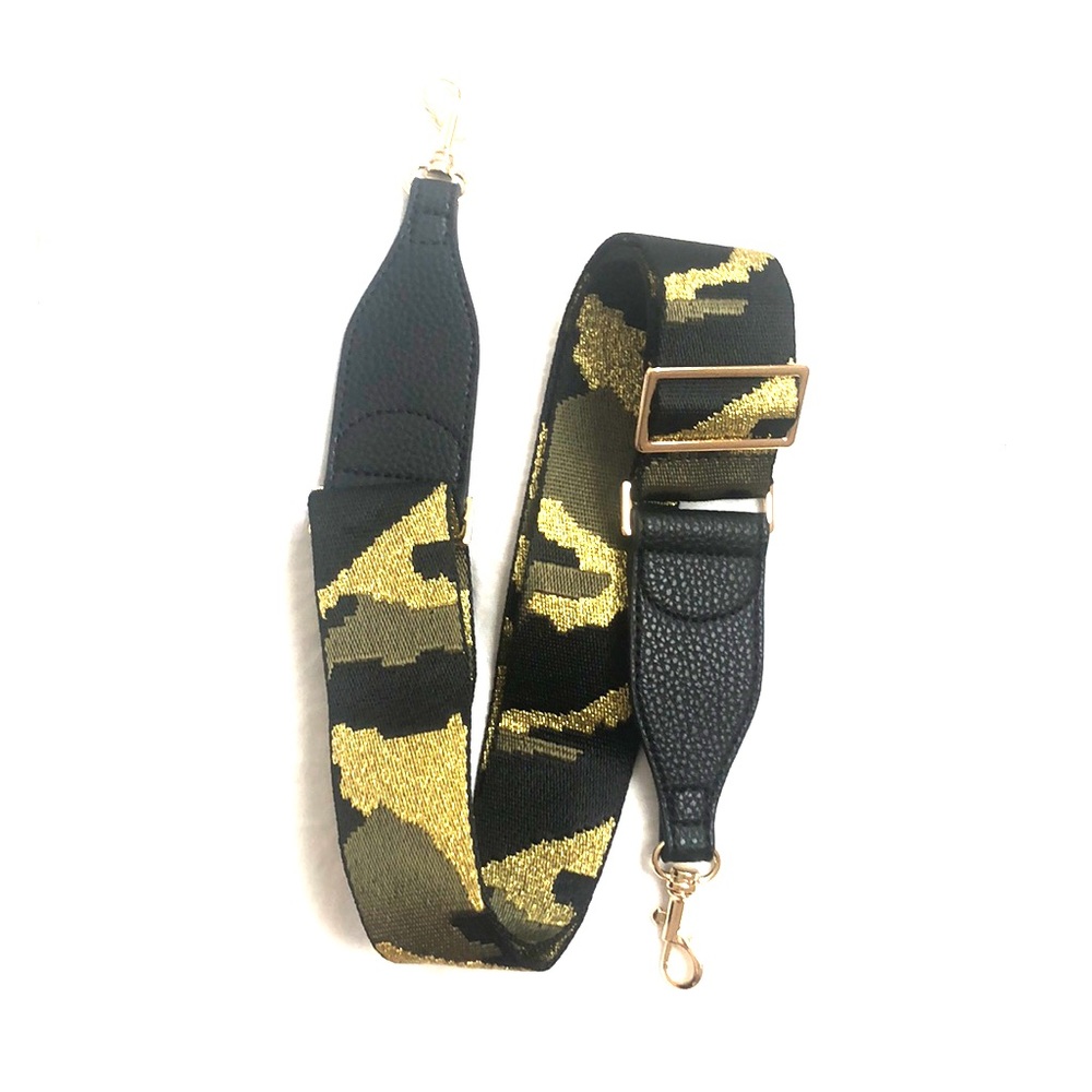 Camo crossbody guitar strap gold hardware.
